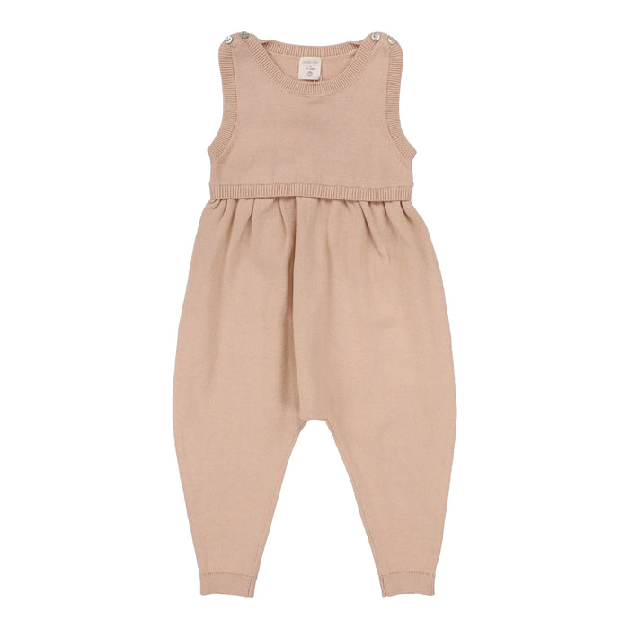 Knit Pink Overalls With White Blouse