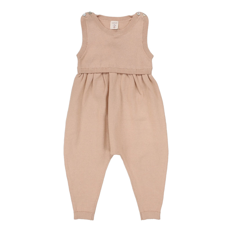 Knit Pink Overalls With White Blouse